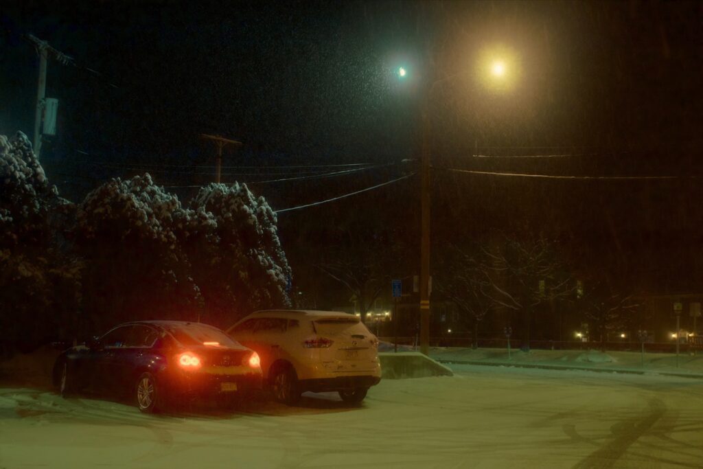cars on a road at night