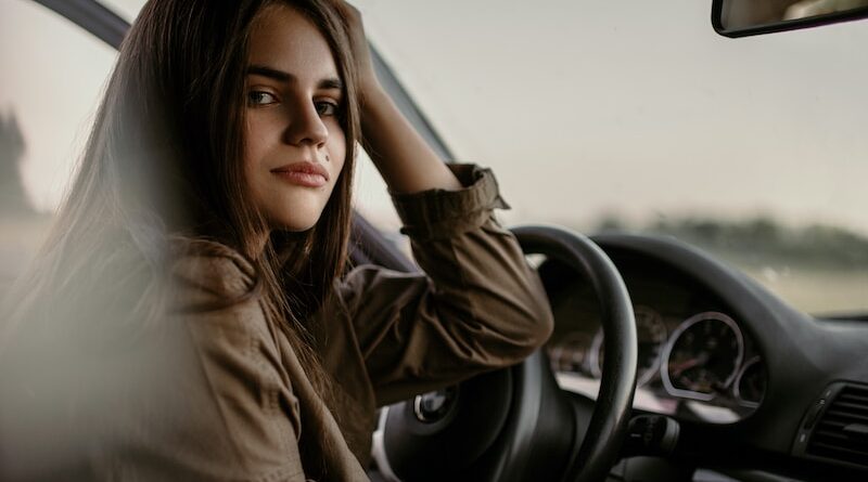 woman sitting inside car